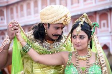 Darshan thoogudeep with nikita thukral in the movie sangolli rayanna